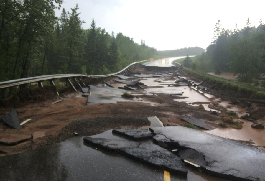 Highway 23 southwest of Duluth, Minn., was closed for repairs after flooding.
