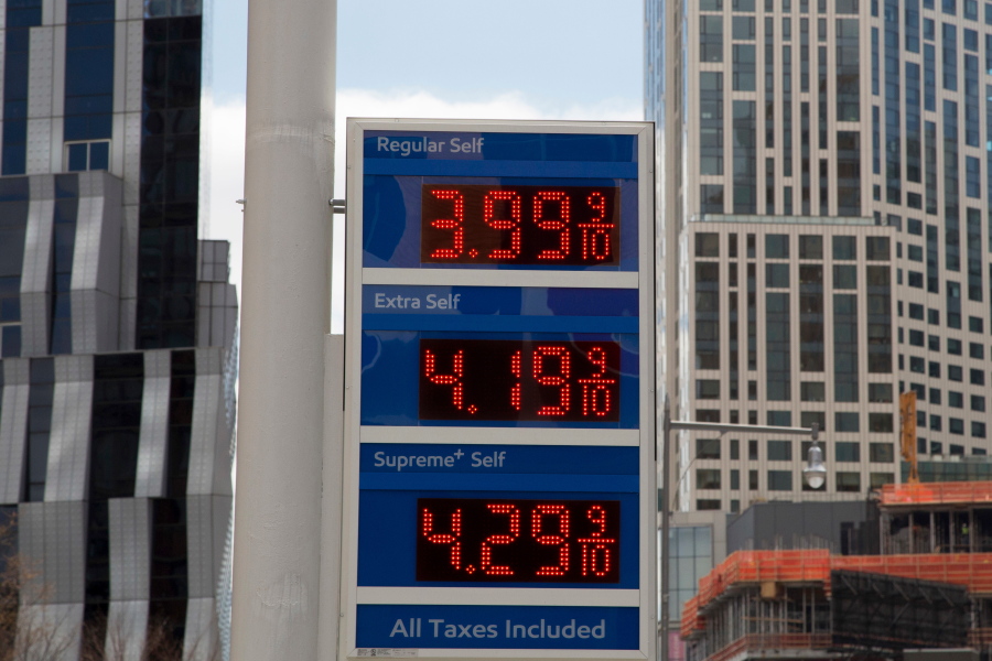FILE- In this April 18, 2018, file photo, gas prices are displayed at a Mobil station in New York. President Donald Trump is declaring that oil prices are too high and blaming a coalition of countries that control a significant portion of the world’s supply of crude petroleum. Trump tweeted on Wednesday: “Oil prices are too high, OPEC is at it again.