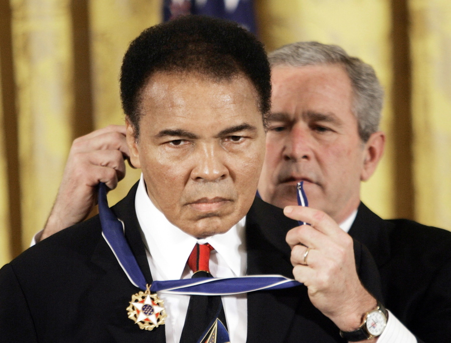 President Bush presents the Presidential Medal of Freedom to boxer Muhammad Ali in the East Room of the White House. President Donald Trump said he is thinking “very seriously” about pardoning Muhammad Ali, even though the Supreme Court vacated the boxing champion’s conviction in 1971.