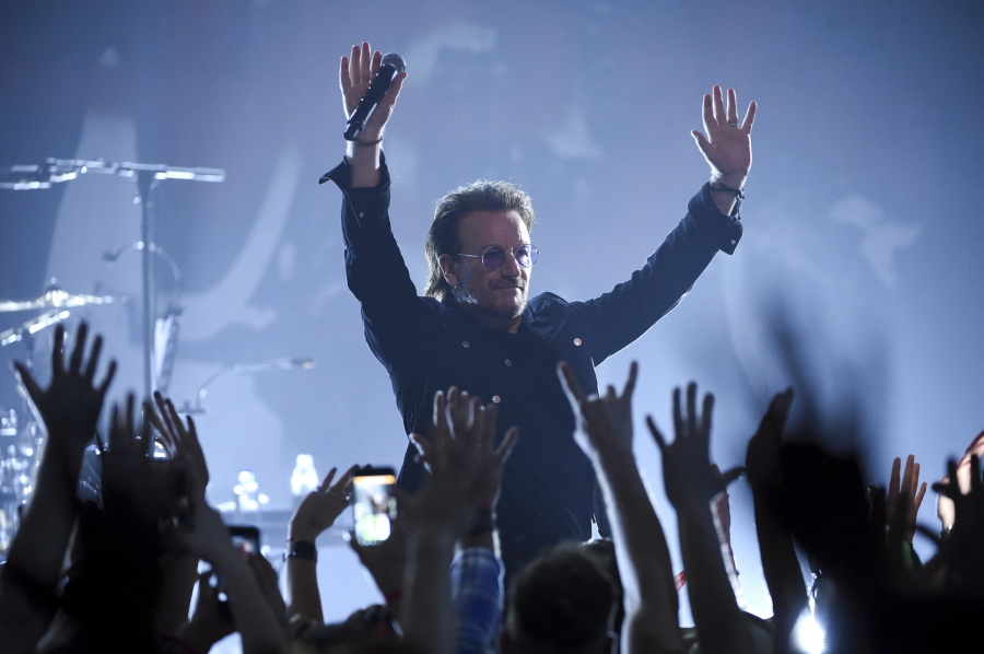 Singer Bono of U2 performs during a concert at the Apollo Theater hosted by SiriusXM on Monday in New York.