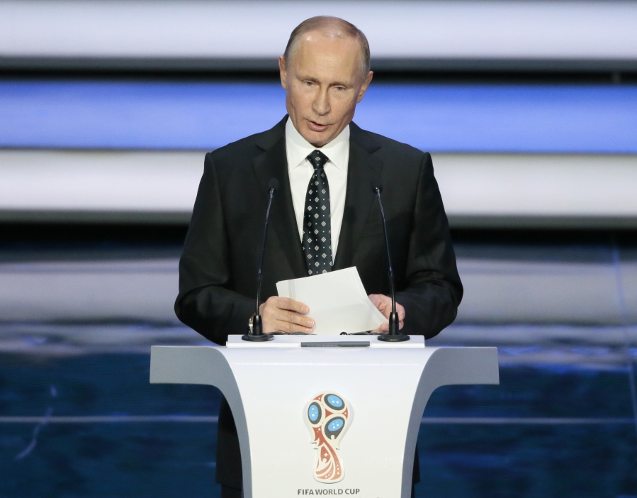 Russian President Vladimir Putin speaks at the 2018 soccer World Cup draw in the Kremlin in Moscow. Vladimir Putin’s Russia was always going to be a controversial host, but few could have imagined the situation that greets the 2018 World Cup. The annexation of Crimea, alleged U.S. election interference, the war in Syria and a poisoned spy in Britain are just a few of the storms surrounding the Kremlin before Putin officially declares the tournament open June 14.