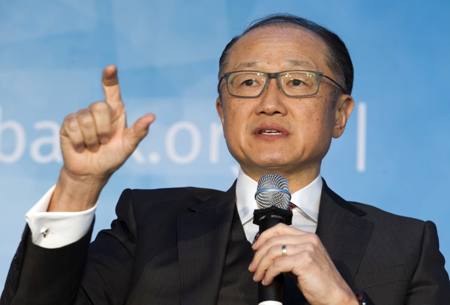 FILE- In this April 21, 2018, file photo World Bank President Jim Yong Kim speaks at the panel Building Human Capital: A Project for the World, during the World Bank/IMF Spring Meetings, in Washington. On Tuesday, June 5, the World Bank issues its semi-annual outlook for the global economy.