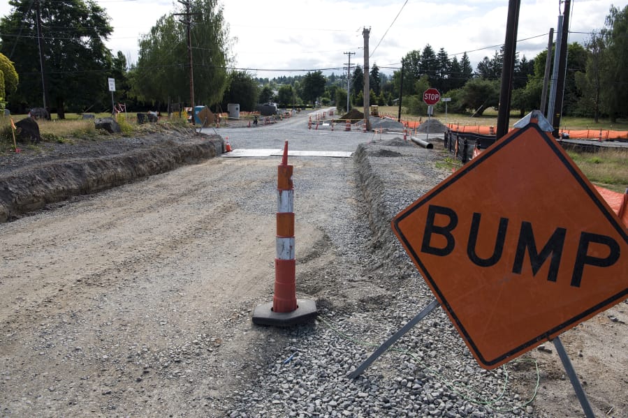 Construction has been steady at the intersection of 154th Street and 10th Avenue. But because of state law, the county is having trouble funding a related project.