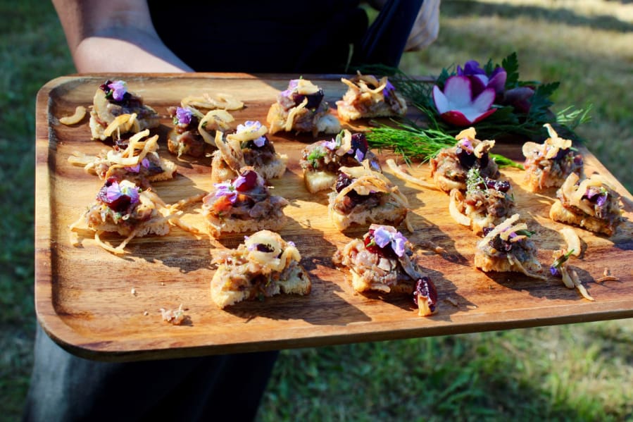 Duck rilette toast points with dijon mustard, pickled cherries, and fried shallots