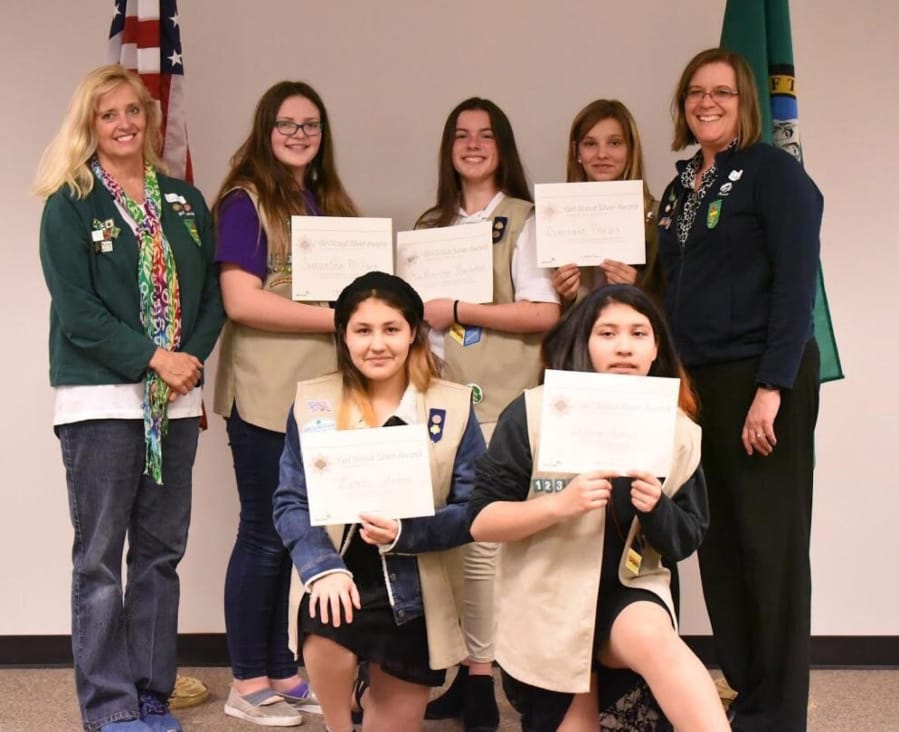 Vancouver Mall: Five Girl Scouts from Troop 12340 received the Silver Award, the second-highest award for service in the community given by the Girl Scouts of Oregon and Southwest Washington. From left: Dawn Phelps, co-leader, Samantha McHarg, Katherine Thornton, Dominique Phelps, Naomi Alonso, Dinora Alonso and Susan Thornton, troop leader.