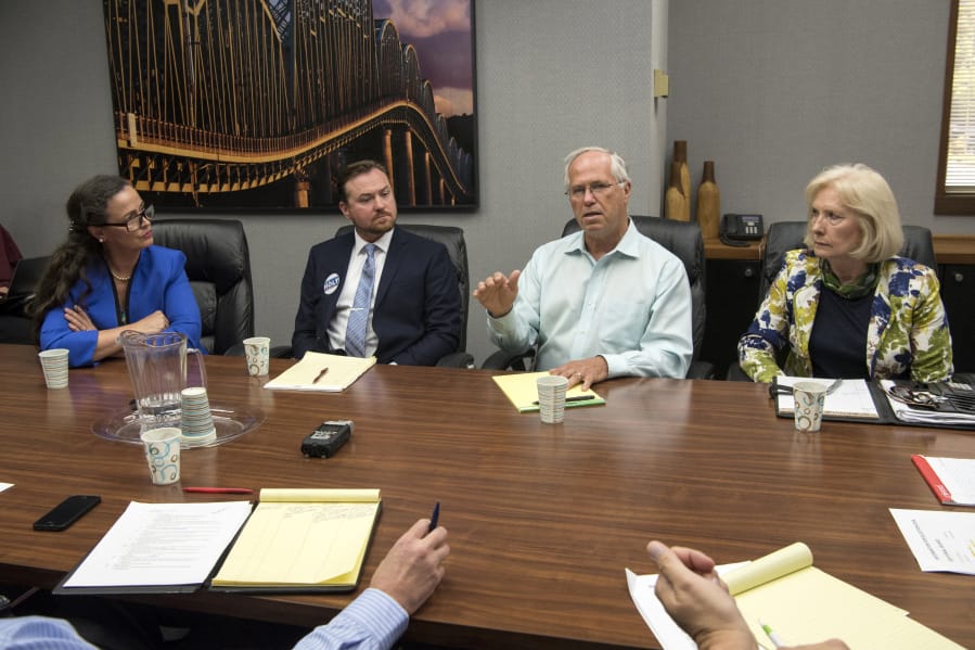 Candidates for Clark County Council chair Christy Stanley, from left, Eric Holt, Marc Boldt and Eileen Quiring square off before The Columbian’s Editorial Board.