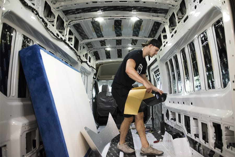 Brandon Anderson, a builder at Van Haus Conversions, starts the initial work of customizing a van at its West Minnehaha workshop. The custom van industry in the region has grown significantly in recent years, fueling companies such as Van Haus that charge at least $30,000 to outfit a van.