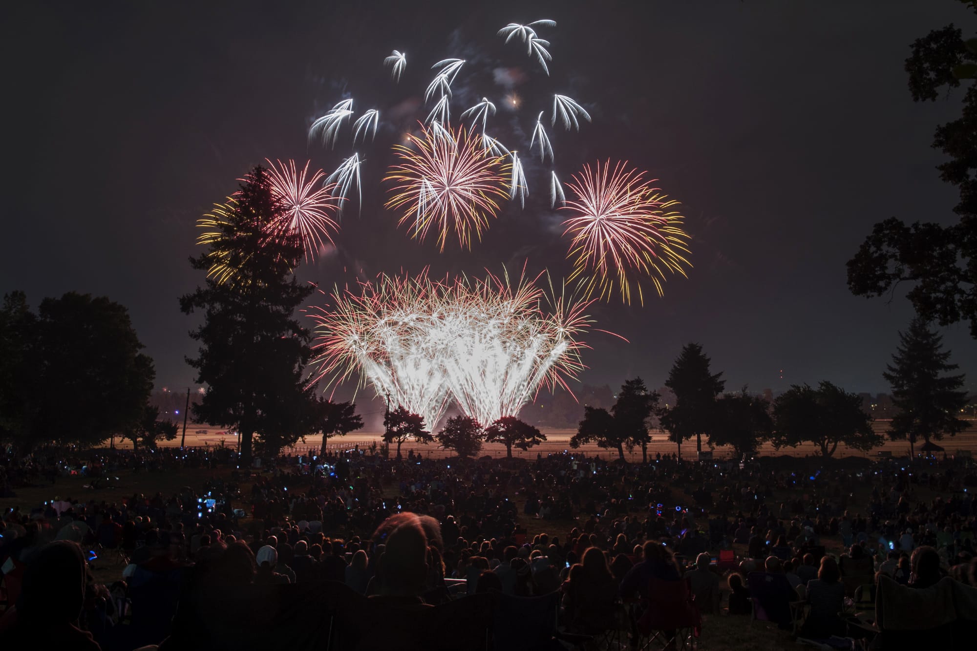 Fireworks light the night sky above Fort Vancouver National Historic Site and Pearson Field on Wednesday evening, July 4, 2018.