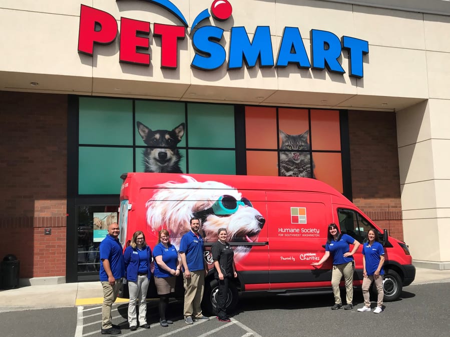 East Vancouver: Humane Society of Southwest Washington employees with their new “Rides to the Rescue” vehicle, which was made possible thanks to a $45,000 grant from PetSmart Charities.
