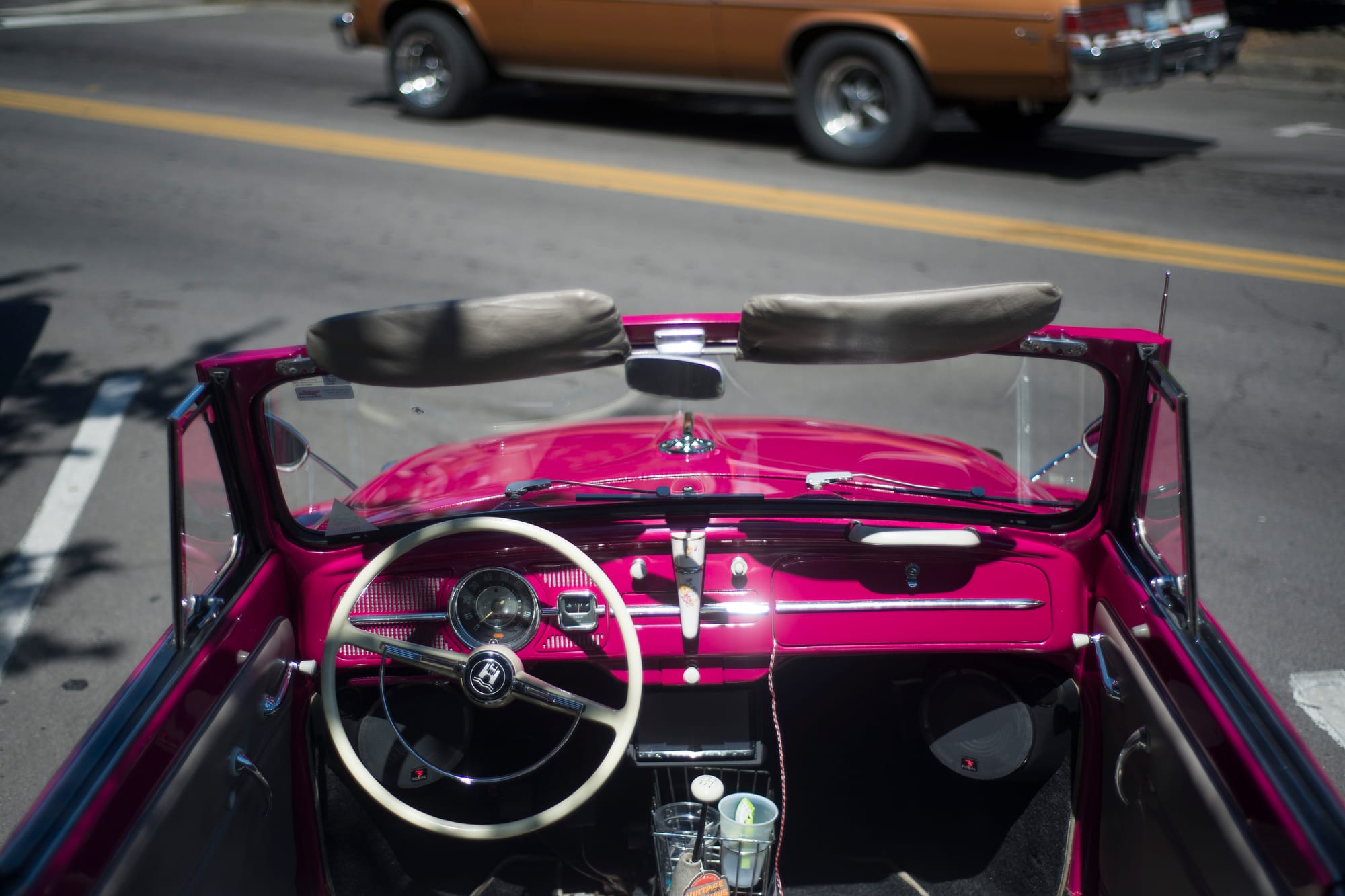 A bright pink VW Bug is parked on Main Street in downtown Vancouver during Cruise the Couve on Saturday, July 21, 2018. Cruise the Couve came back for a second year, after the event was adopted and renamed by local business owners in 2017.