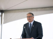 Gov. Jay Inslee speaks during the grand opening ceremony of the West Vancouver Freight Access project on Tuesday. Inslee said Southwest Washington will continue to have a voice as Oregon considers tolling Interstate 5 and Interstate 205.