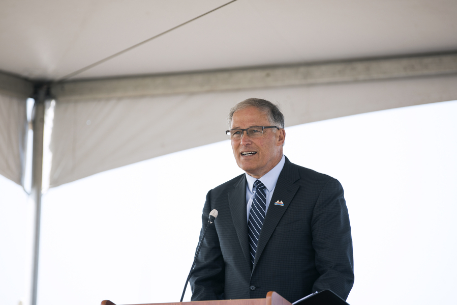 Gov. Jay Inslee speaks during the grand opening ceremony of the West Vancouver Freight Access project on Tuesday. Inslee said Southwest Washington will continue to have a voice as Oregon considers tolling Interstate 5 and Interstate 205.