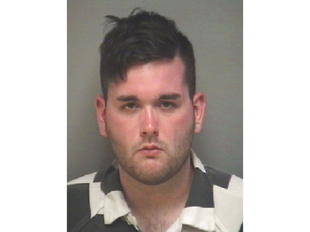 FILE - This undated file photo provided by the Albemarle-Charlottesville Regional Jail shows James Alex Fields Jr., accused of plowing a car into a crowd of people protesting a white nationalist rally in Charlottesville, Va., killing a woman and injuring dozens more, has been charged with federal hate crimes. The Department of Justice announced that Fields was charged in an indicted returned Wednesday, June 27, 2018.