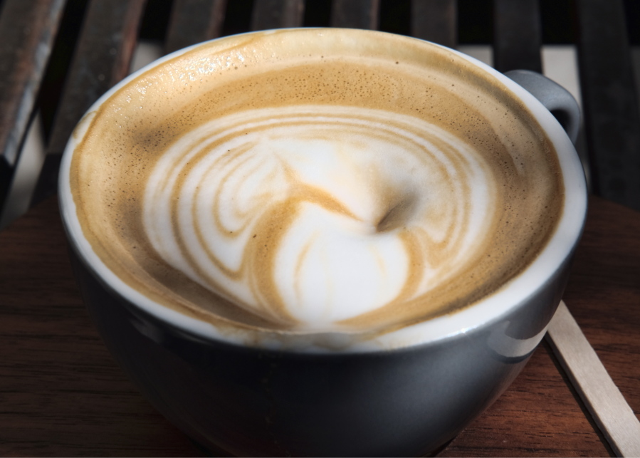 This Thursday, March 29, 2018 photo shows a cup of coffee at a cafe in Los Angeles. A 10-year study released on Monday, July 2, 2018 shows that coffee drinkers had a lower risk of death than abstainers, including those who downed at least eight cups daily. The benefit was seen with instant, ground, decaf, and in people with genetic glitches affecting how their bodies use caffeine.