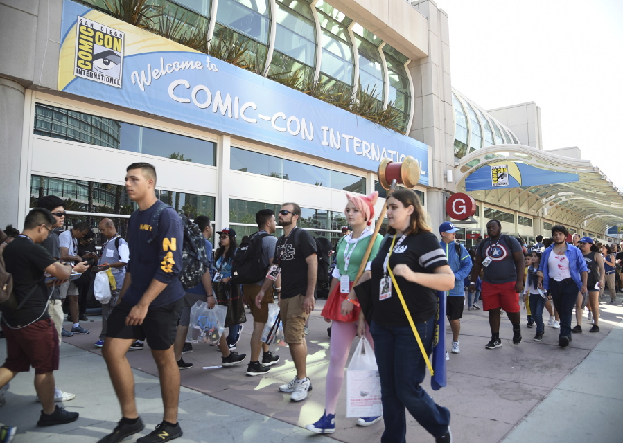 Guests attend the first day of Comic-Con International in San Diego. More than 130,000 pop culture devotees are descending on San Diego’s Gaslamp District, Wednesday, July 18, 2018, for the annual four-day comic book convention Comic-Con. And without Marvel Studios, HBO and Star Wars at the convention, other brands have a unique opportunity to pop.