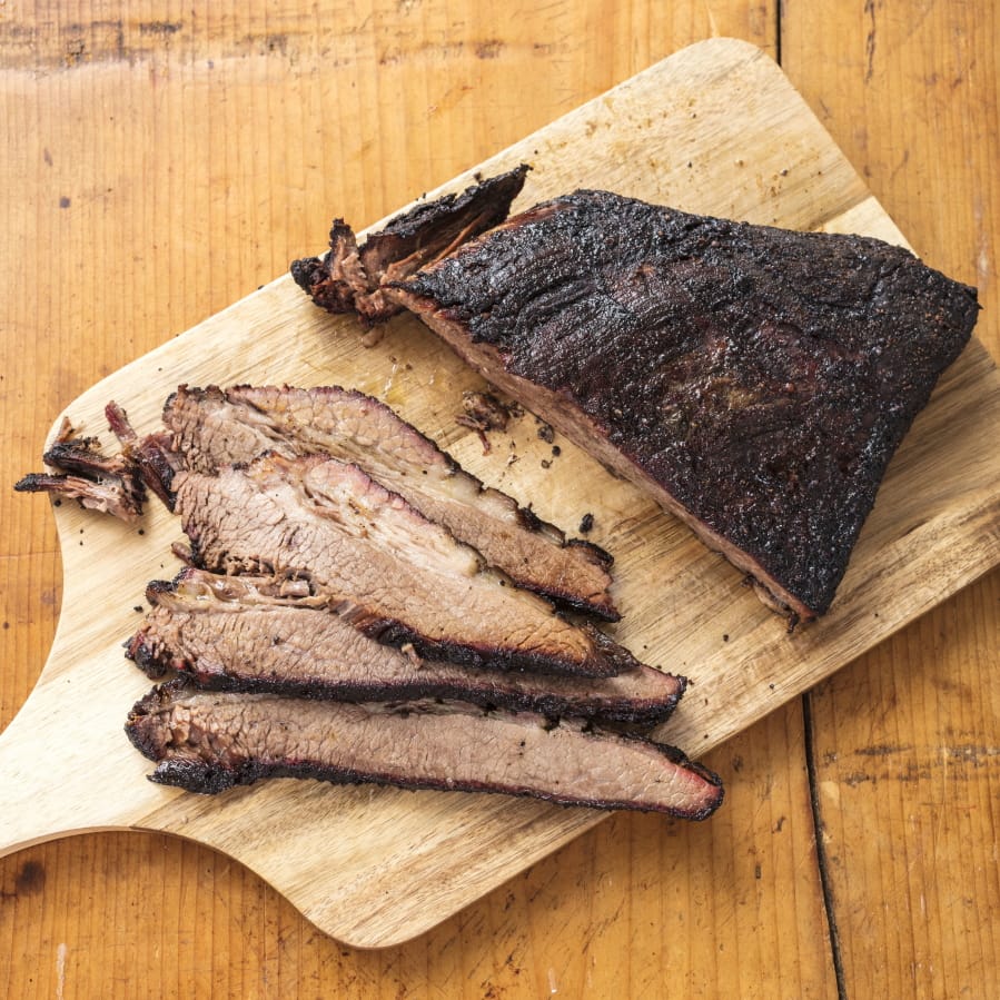 Barbecued beef brisket in Brookline, Mass. This recipe appears in the cookbook “Master of the Grill.” (Daniel J.