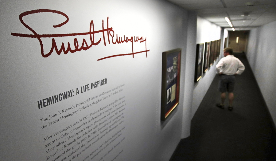 A visitor views the “Ernest Hemingway: A Life Inspired” exhibition, featuring books and belongings from the archives of author Hemingway, at the John F. Kennedy Presidential Library and Museum in Boston, Thursday, June 28, 2018. The Boston complex has become the world’s leading research center for Hemingway studies.