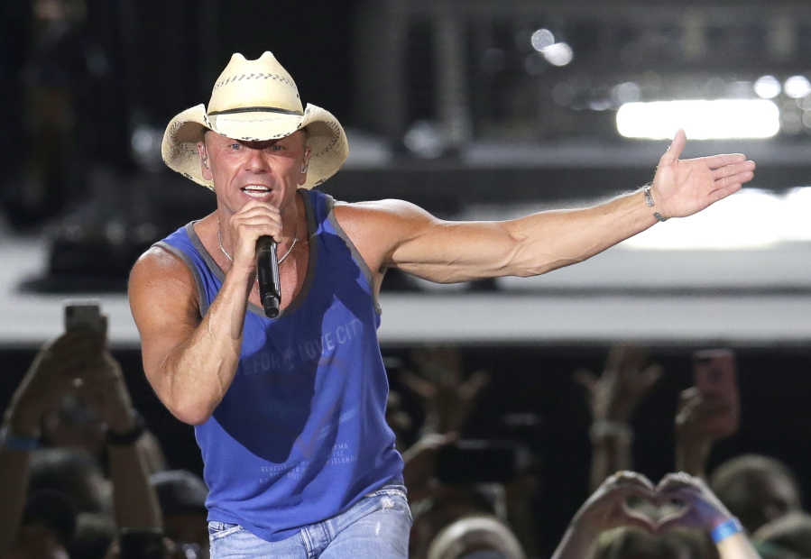Kenny Chesney performs during the Trip Around the Sun Tour in Phoenix on June 23.