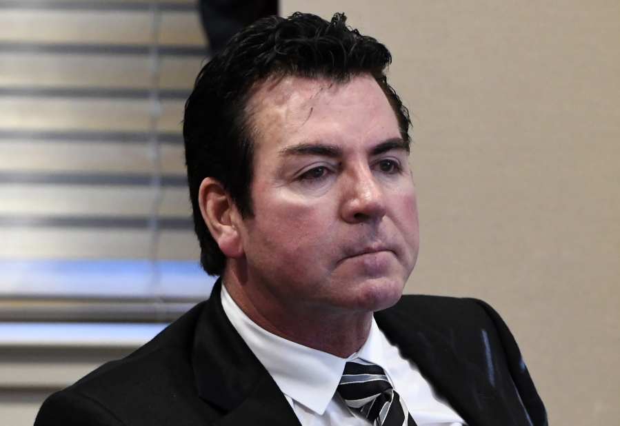 FILE - In this Wednesday, Oct. 18, 2017, file photo, Papa John’s founder and CEO John Schnatter attends a meeting in Louisville, Ky. Schnatter is apologizing after reportedly using a racial slur during a conference call in May 2018. The apology Wednesday, July 11, 2018, comes after Forbes cited an anonymous source saying the pizza chain’s marketing firm broke ties with the company afterward. (AP Photo/Timothy D.
