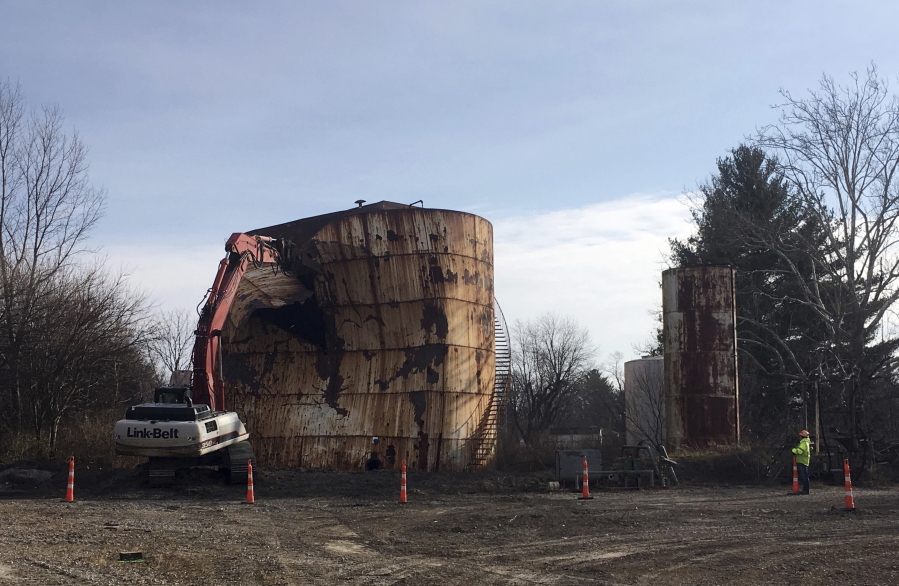 A tank at a Kiel Bros. facility is torn down in Indianapolis. The collapse of Kiel Bros. Oil Co. in 2004 was widely publicized. Less known is that the state of Indiana and, to a smaller extent, Kentucky and Illinois, are still on the hook for millions of dollars to clean up more than 85 contaminated sites across the three states, including underground tanks that leaked toxic chemicals into soil, streams and wells.