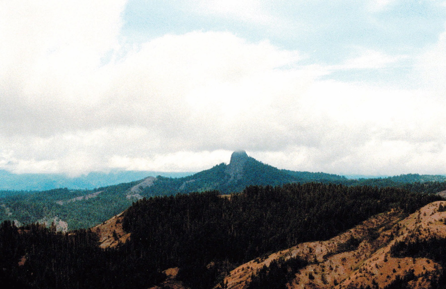 Pilot Rock rises into the clouds July 6, 2000, in the Cascade-Siskiyou National Monument near Lincoln, Ore. Contrary to President Donald Trump’s numerous efforts to shred Obama’s legacy, U.S. Justice Department lawyers are in Obama’s corner as they defend his expansion of the national monument in Oregon.