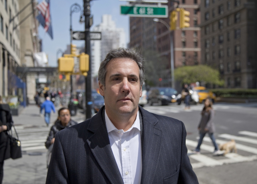 Attorney Michael Cohen walks down the sidewalk in New York on April 11.