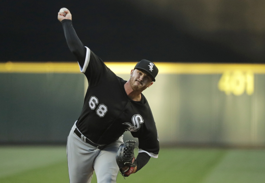 Chicago White Sox starting pitcher Dylan Covey throws against the Seattle Mariners during the third inning of a baseball game, Saturday, July 21, 2018, in Seattle. (AP Photo/Ted S.