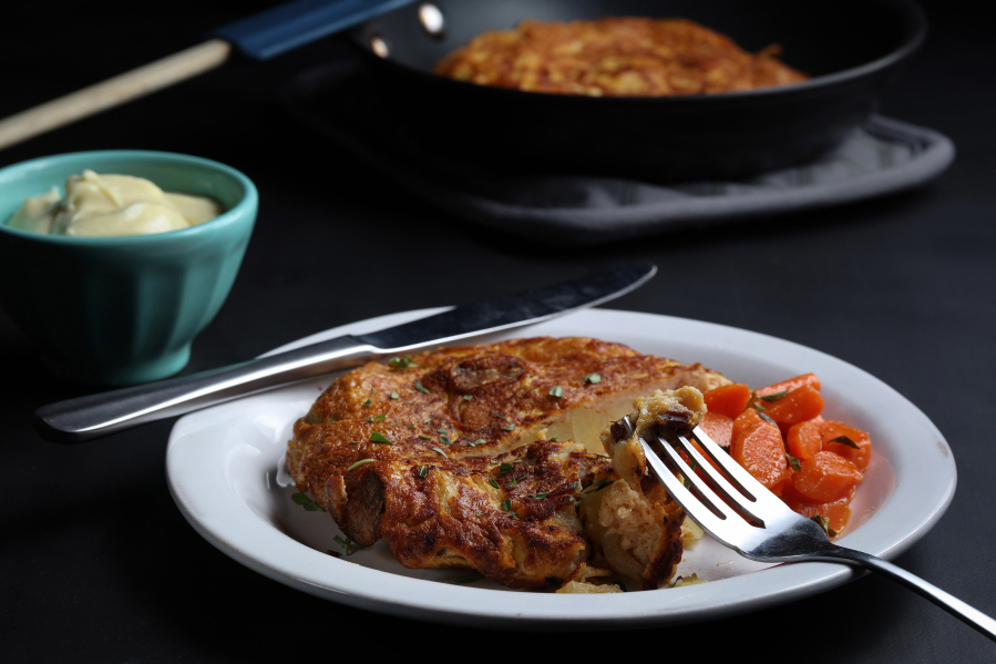 This chorizo and potato omelet is an ideal anchor for a Spanash tapas menu for eight. The herby garlic carrots in smoky sherry vinaigrette provide a tart counterpoint.