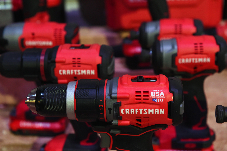 Craftsman cordless drills are shown. Now owned by Stanley Black & Decker, a new line of Craftsman tools will be sold at Lowe’s and Ace hardware stores.