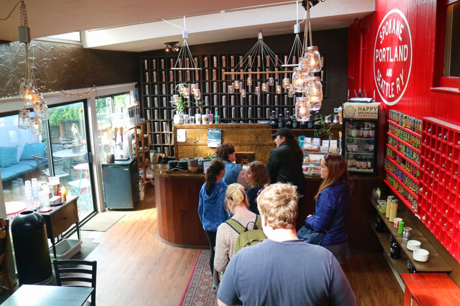 At Tea Chai — Sellwood location, customers enter the “Portlandia”-featured teahouse through a train caboose, which opens up into an airy space. Erin E.