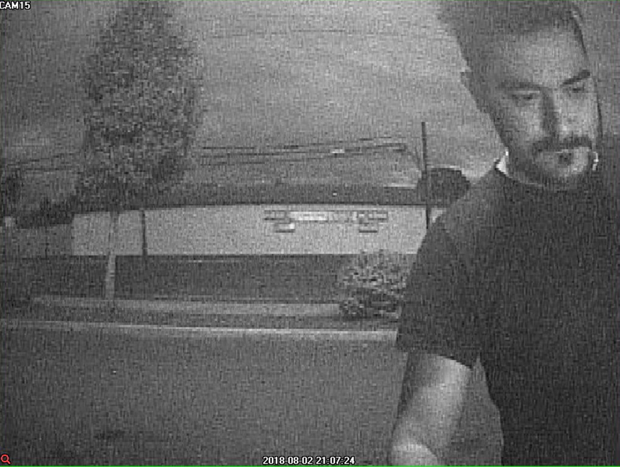 The Woodland Police Department is trying to identify this man, shown in still taken from surveillance video at Fibre Federal Credit Union in Woodland. The man is suspected of tampering with the ATM by fitting it with a skimming device used to steal bank card information.