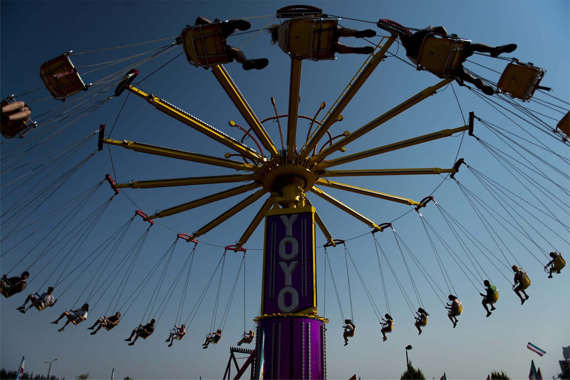 Attendees at the Clark County Fair ride the Yoyo swing ride on Tuesday afternoon, Aug. 7, 2018.