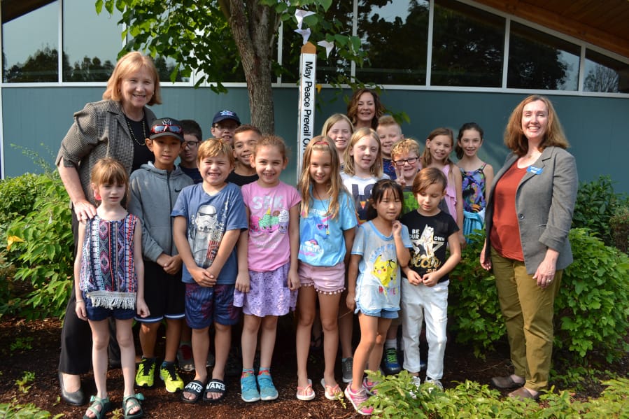 Central Park: Kids in the Vancouver Parks and Recreation’s summer camp program helped dedicate a Peace Pole at the Marshall Center.