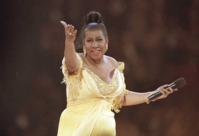 In this Jan. 19, 1993 file photo, singer Aretha Franklin performs at the inaugural gala for President Bill Clinton in Washington. Franklin died Thursday, Aug. 16, 2018 at her home in Detroit. She was 76.