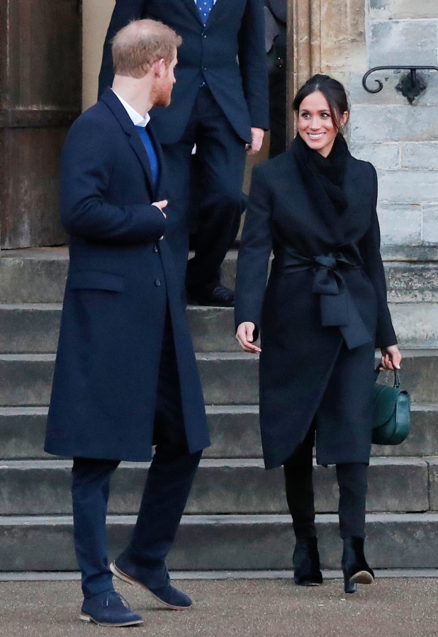 Britain’s Prince Harry and his then-fiancee Meghan Markle leave after a visit to Cardiff Castle in Cardiff, Wales, in January.