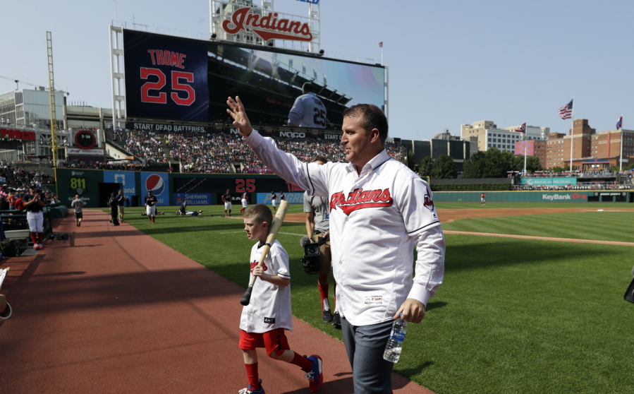 Former Cleveland Indians and Hall of Famer Jim Thome waves to fans before a baseball game between the Cleveland Indians and the Baltimore Orioles, Saturday, Aug. 18, 2018, in Cleveland. The club’s career home run leader, Thome was honored during a ceremony Saturday. Thome belted 337 of his 612 career homers during two stints with the Indians and his powerful swing helped the club rise from perennial laughingstock to one of baseball’s best teams in the 1990s.
