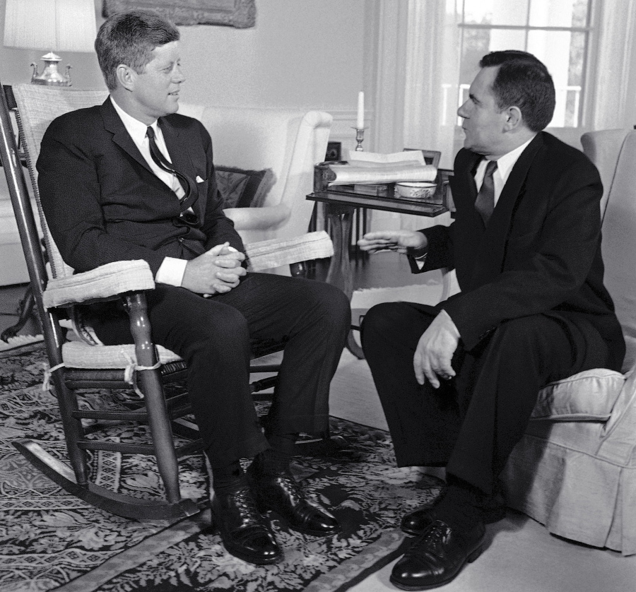 FILE - In this Oct. 6, 1961, file photo, President John F. Kennedy, left, sits in his rocker in the White House in Washington, as he talks with Soviet Foreign Minister Andrei Gromyko about the Berlin situation. Beginning Friday, Aug. 3, 2018, Eldred’s auction gallery in East Dennis, Mass., on Cape Cod, is auctioning items associated with the late president, including a rocking chair that Kennedy used in the White House.
