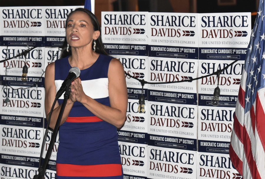 Sharice Davids addresses her supporters at Breit’s Stein and Deli in Kansas City, Kan., on Tuesday. Davids, a Democrat, is running for a seat in Kansas’ 3rd Congressional District.