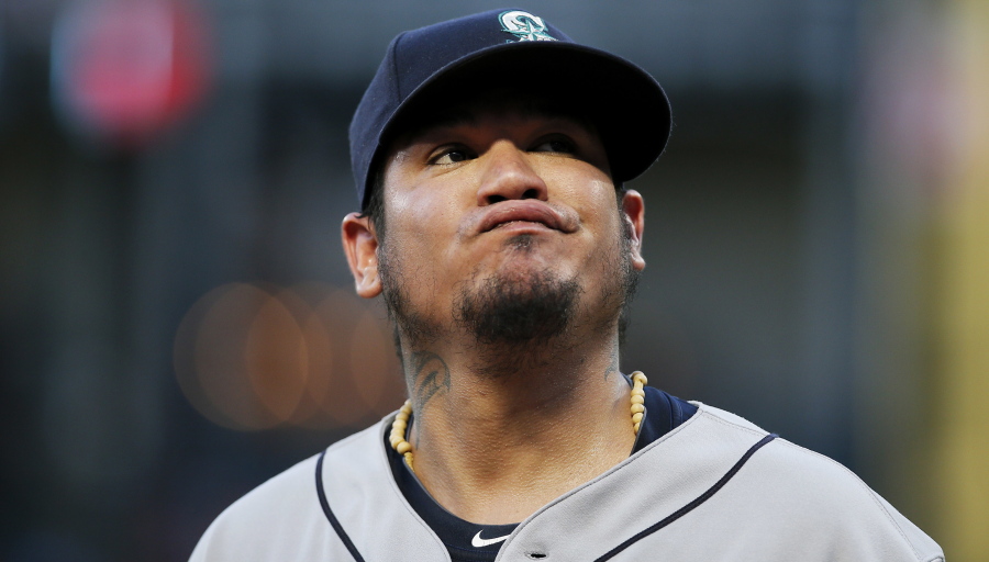 Seattle Mariners starting pitcher Felix Hernandez reacts after allowing a soft bunt-single by Texas Rangers’ Carlos Tocci during the third inning of a baseball game Tuesday, Aug. 7, 2018, in Arlington, Texas. The Rangers won 11-4.