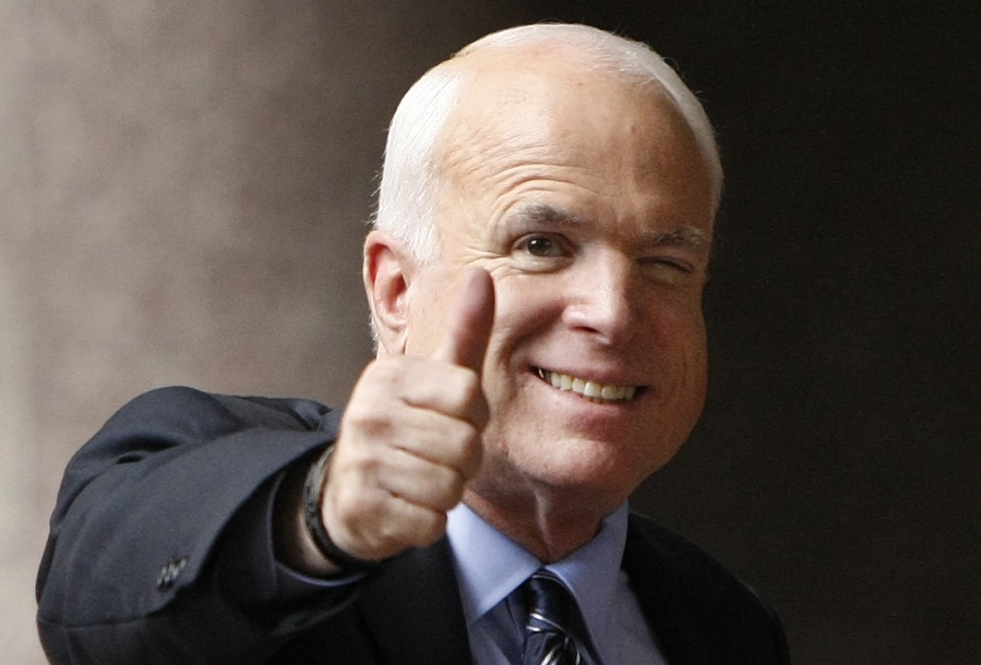 FILE - In this Sept. 28, 2008 file photo, Republican presidential candidate, Sen. John McCain, R-Ariz., gives a thumbs up as he arrives at his campaign headquarters in Arlington, Va. McCain’s family says the Arizona senator has chosen to discontinue medical treatment for brain cancer.