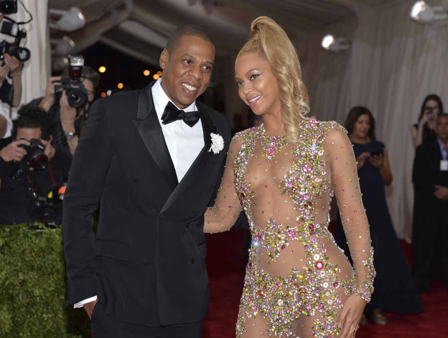 Jay Z, left, and Beyoncé arrive at The Metropolitan Museum of Art’s Costume Institute benefit gala May 4, 2015, in New York.