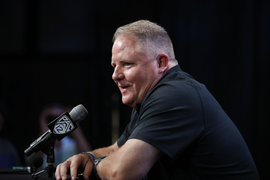 FILE - In this July 25, 2018, file photo, UCLA head coach Chip Kelly speaks at the Pac-12 Conference NCAA college football Media Day in Los Angeles. Kelly, who confounded opposing teams with his blur offense for the Oregon Ducks a few years back, returns to the Pac-12 this season as head coach of the UCLA Bruins. (AP Photo/Jae C.