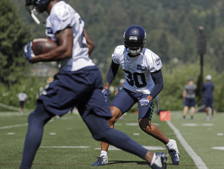 Seattle Seahawks strong safety Bradley McDougald (30) tracks a teammate with the ball during NFL football training camp, Thursday, July 26, 2018, in Renton, Wash. (AP Photo/Ted S.