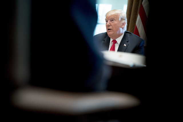 President Donald Trump speaks during a cabinet meeting in the Cabinet Room of the White House, Thursday, Aug. 16, 2018, in Washington.