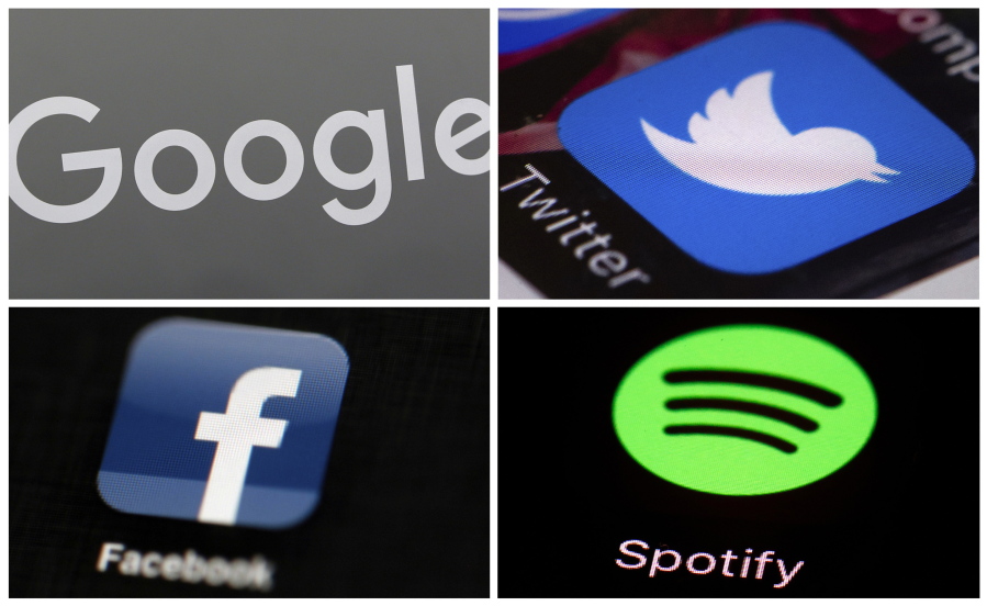 This photo combo of images shows, clockwise, from upper left: a Google sign, and apps for Twitter, Spotify and Facebook. YouTube, Facebook, Twitter, Spotify and other sites are finding themselves in a role they never wanted, as gatekeepers of discourse on their platforms, deciding what should and shouldn’t be allowed and often angering almost everyone in the process.