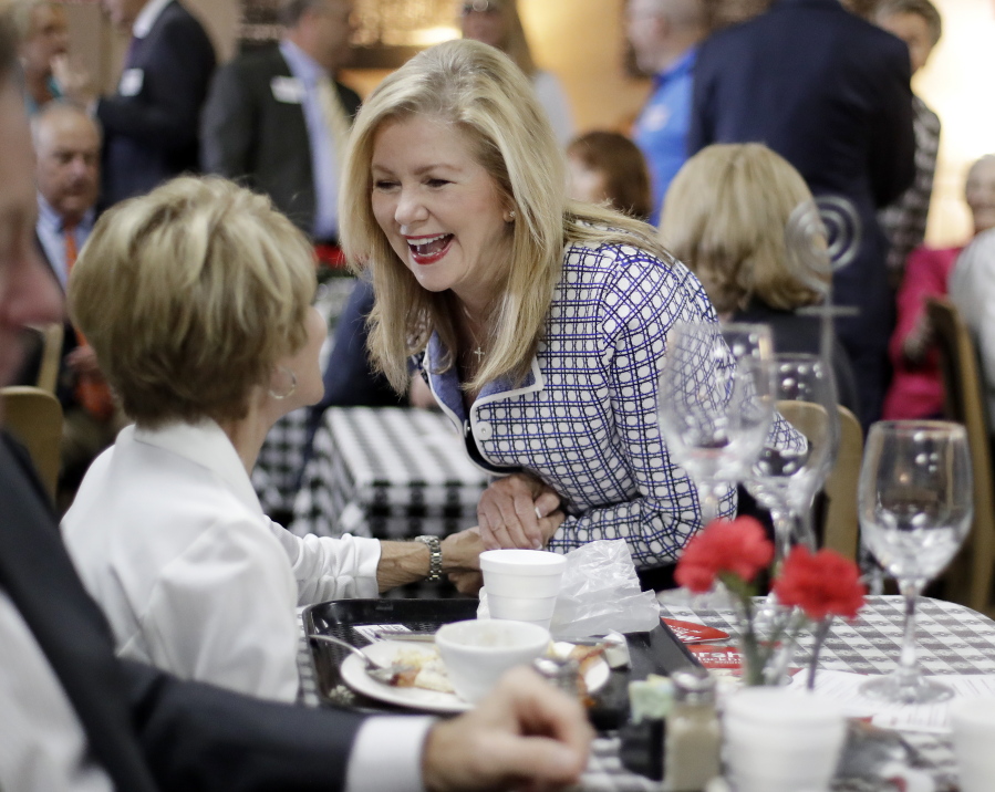 Republican U.S. Rep. Marsha Blackburn campaigns Thursday at a cafe in Brentwood, Tenn. Blackburn is strongly embracing President Donald Trump as she claims the Republican nomination for Tennessee’s open U.S. Senate seat.