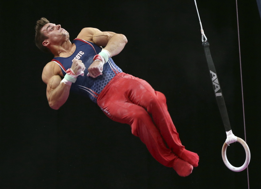 Sam Mikulak competes on the rings at the U.S. Gymnastics Championships, Saturday, Aug. 18, 2018, in Boston.