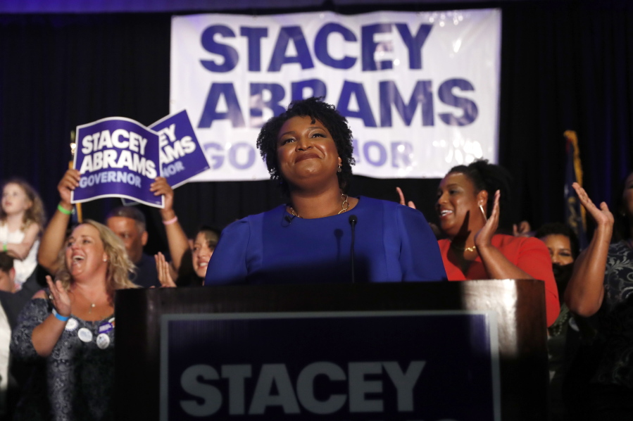 Georgia Democratic gubernatorial candidate Stacey Abrams smiles before speaking to supporters May 22 during an election-night watch party in Atlanta.