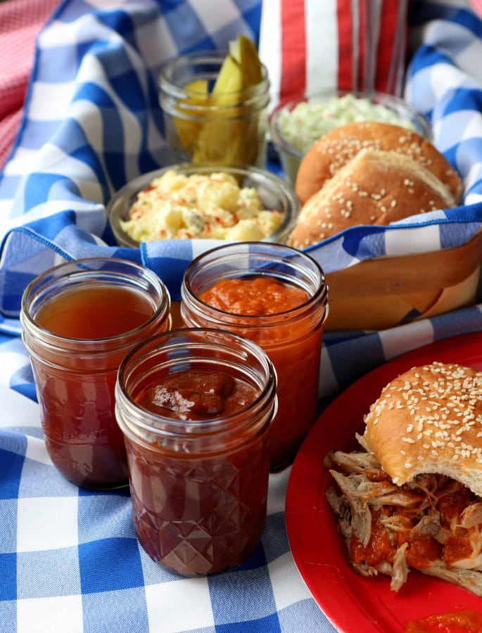 A selection of homemade barbecue sauces: Texas barbecue sauce, apple-bourbon barbecue sauce and Carolina barbecue sauce. (Hillary Levin/St.