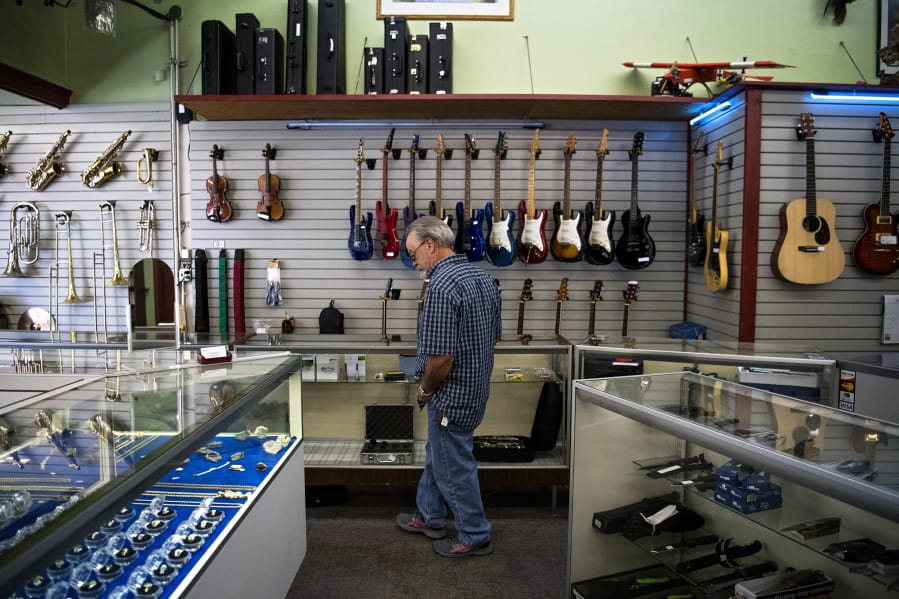 Pawn shop businesses booming as more people seek extra cash